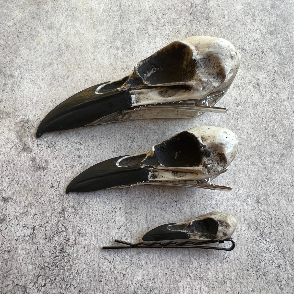 Skull bride Halloween woodland animal skull bone jewelry rave skull hair clip pins made out of resin by artist Raven Ranch Studio.