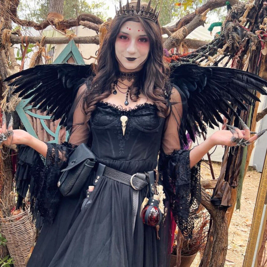 raven skull brooch pin worn by raven queen at ren faire