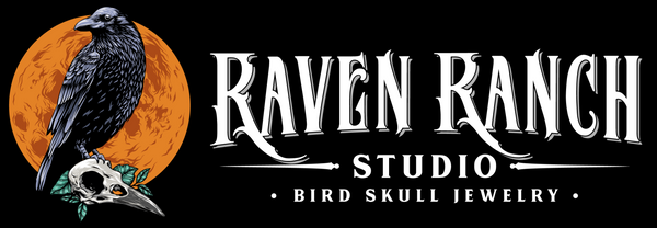 raven ranch studio logo, maker of resin castings of real bird skulls, raven skulls and bone jewelry.