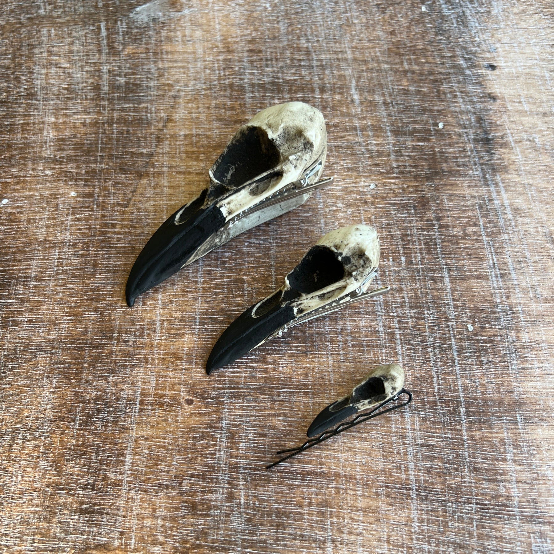 Skull bride Halloween woodland animal skull bone jewelry rave skull hair clip pins made out of resin by artist Raven Ranch Studio.