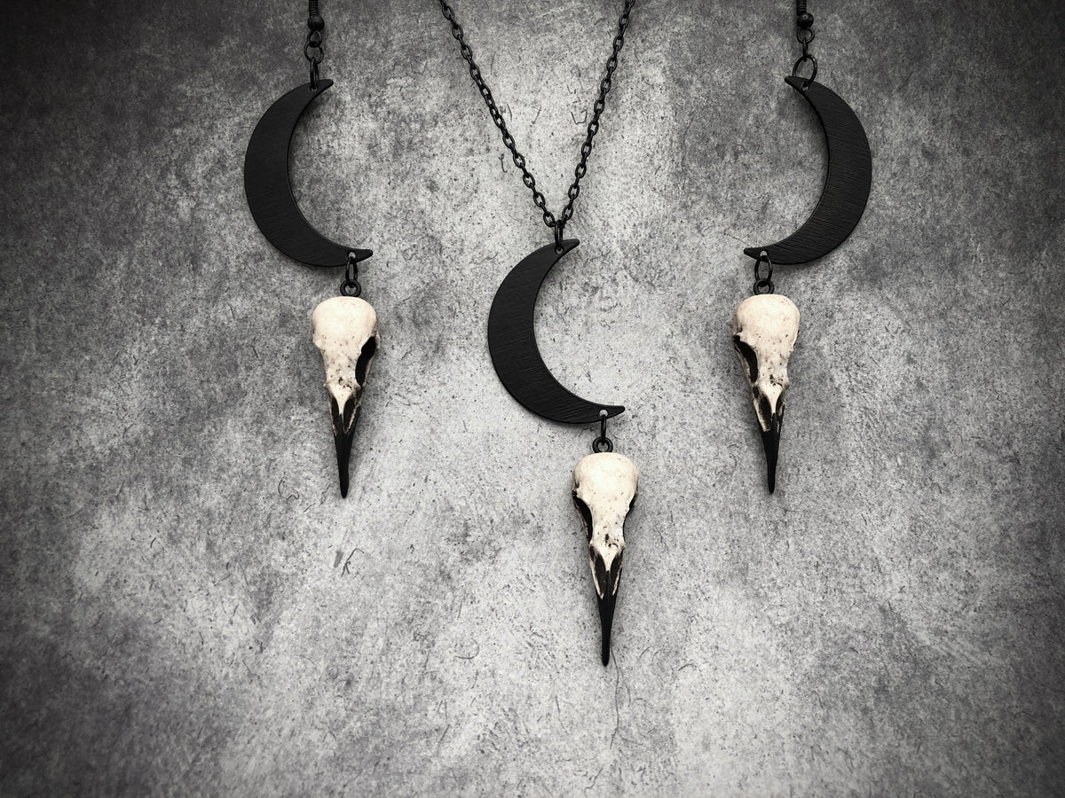 Bone jewelry necklace earring set of crescent waxing waning moon raven goth lunar charm and bird skull.