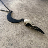 Crescent moon charm pendant and bone jewelry mini resin raven skull dangle pendant by a handmade artist making resin bird skulls.
