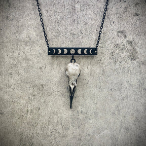 Moon phase horizontal bar charm pendant and bone jewelry mini resin raven skull dangle pendant by artist making resin bird skulls.