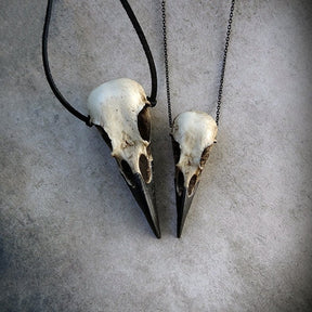 Large life size resin raven skull necklace pendant bone jewelry and a mini raven animal skull that are sold as a set.